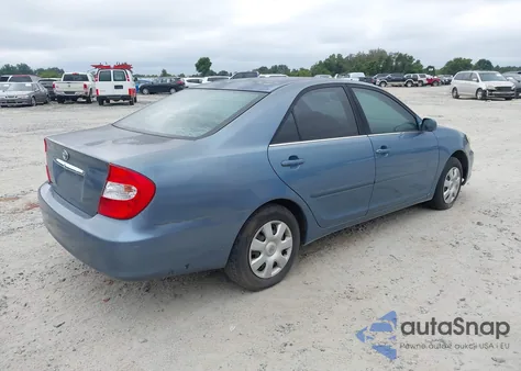 2002 Toyota Camry Le z USA, uszkodzony, nr VIN 4T1BE32K22U573578